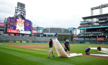 The opening game of the Giants-Rockies series has been delayed and is now set for a Saturday doubleheader.